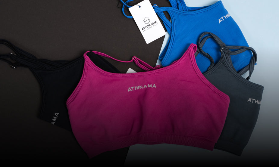 Detalhe de tops esportivos femininos Athinama em várias cores. Roupas fitness de alta performance